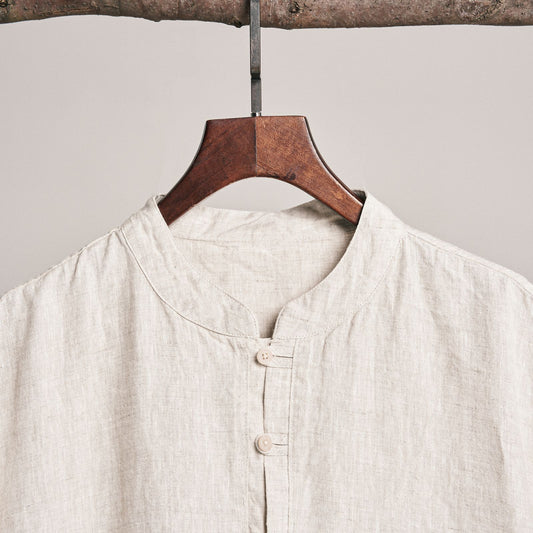 Natural linen button shirt on a hanger